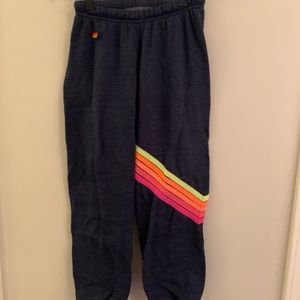 Aviator Nation - Navy Chevron Sweatpants with neon rainbow stitch